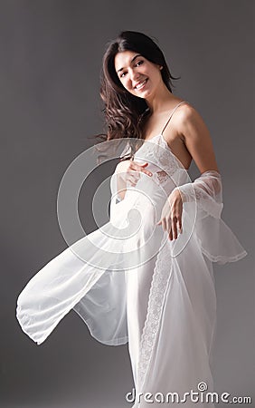 Young Woman in Lovely White Nightgown