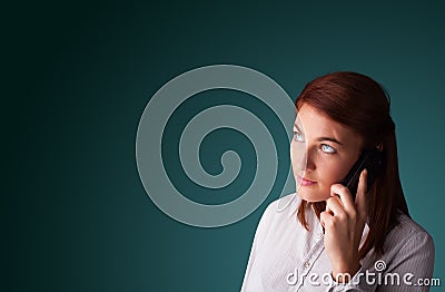 Young woman making phone call with copy space