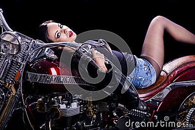 Young woman on the motorcycle