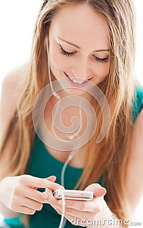 Young woman with music player