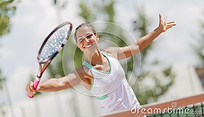 Young woman playing tennis