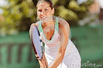 Young woman playing tennis