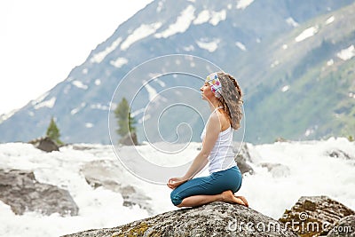 Young woman is practicing yoga