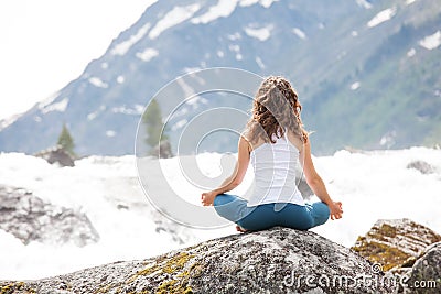 Young woman is practicing yoga