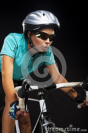 Young woman riding bike