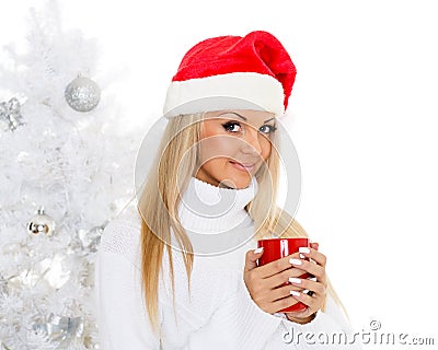 Young woman in Santa Claus cap.