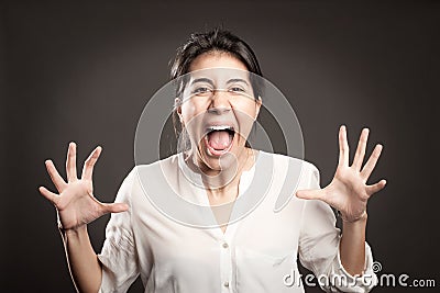 Young woman screaming