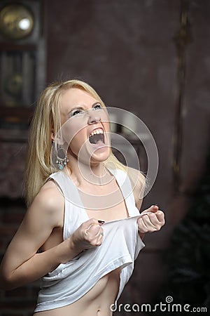 Young woman screaming in despair