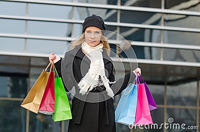 Young woman with shopping bags