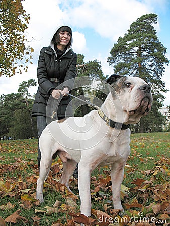 Young woman and strong dog