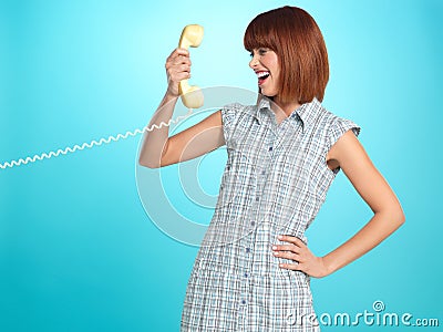 Young woman surprised face expression telephone