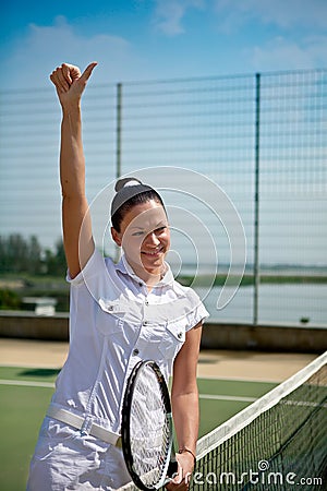 Young woman on a tennis court
