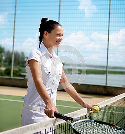 Young woman on a tennis court