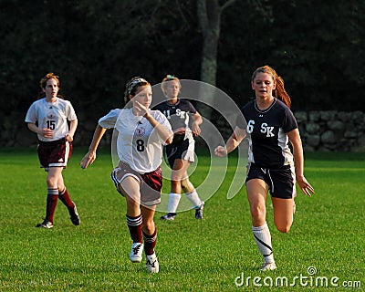 Young Women competing in High School Soccer.