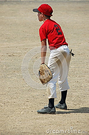 Youth baseball player in field