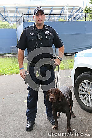 YPD transit bureau K-9 police officer and Labrador K-9 Ellis providing security at National Tennis Center during US Open 2014