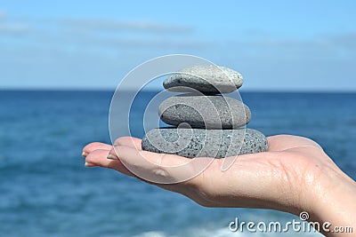 Zen stones in hand