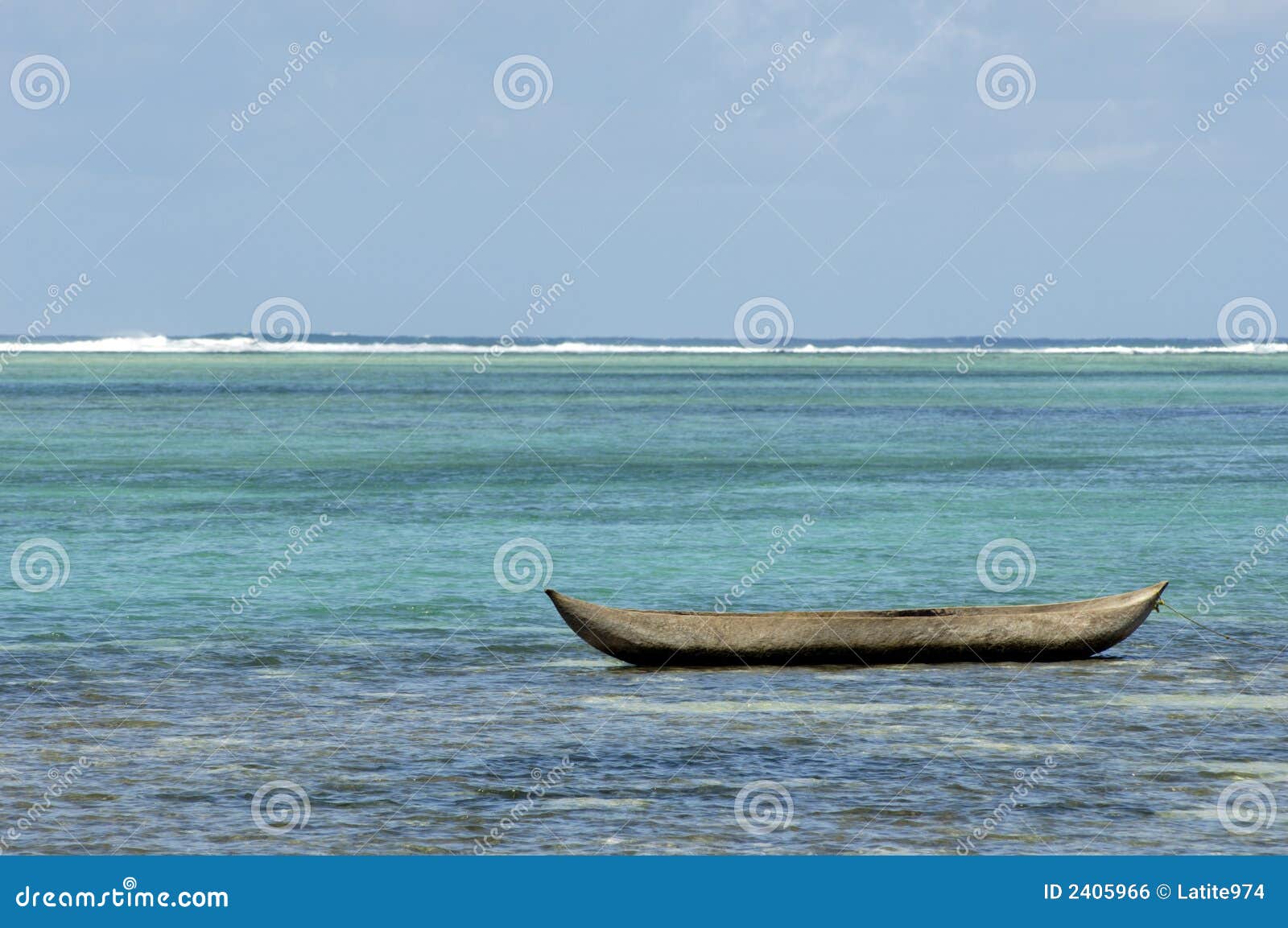 dugout canoe in Madagascar lagoon.