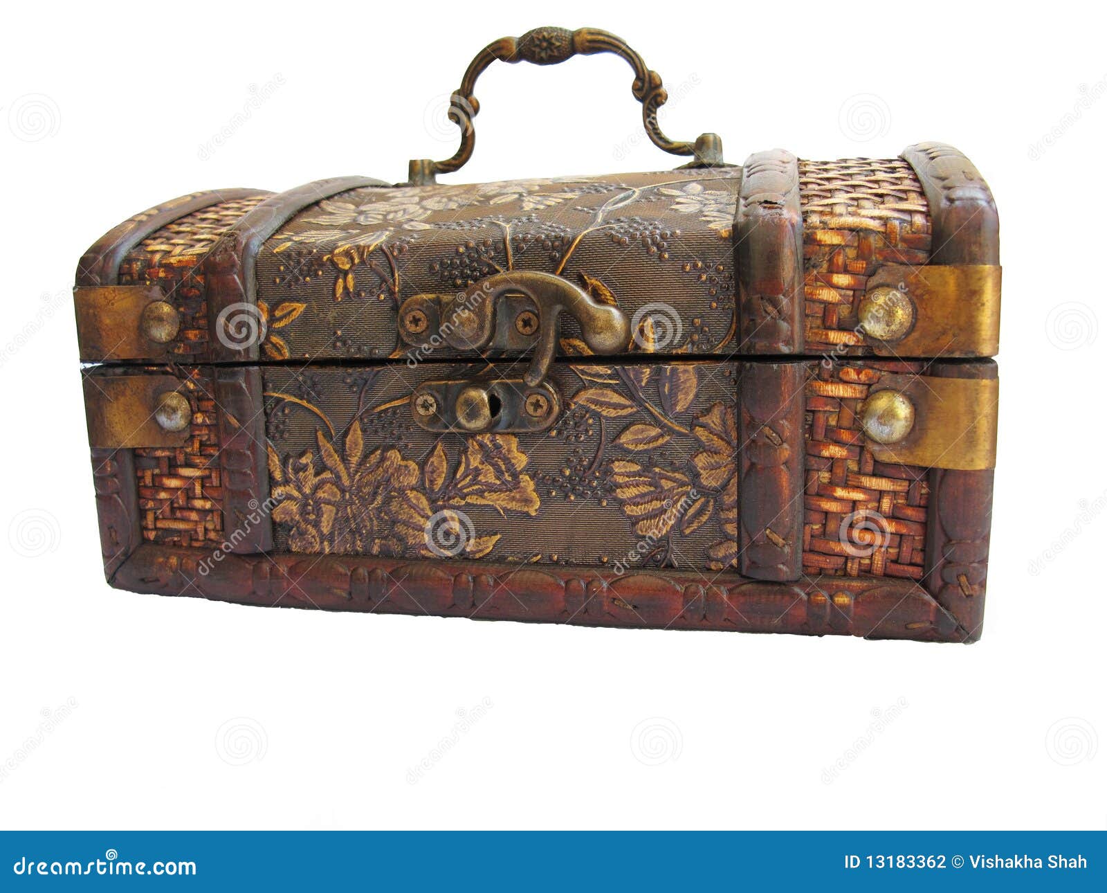 An ancient wooden crafted box with metal lock.