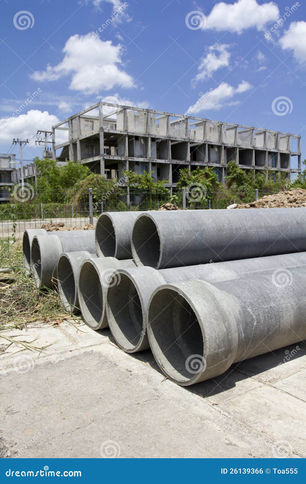 Asbestos pipes for drain in construction site.