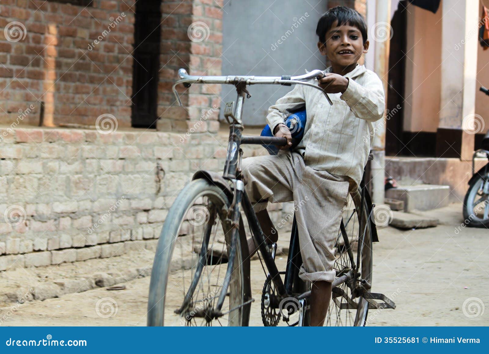 asian-boy-cycle-riding-medium-shot-india