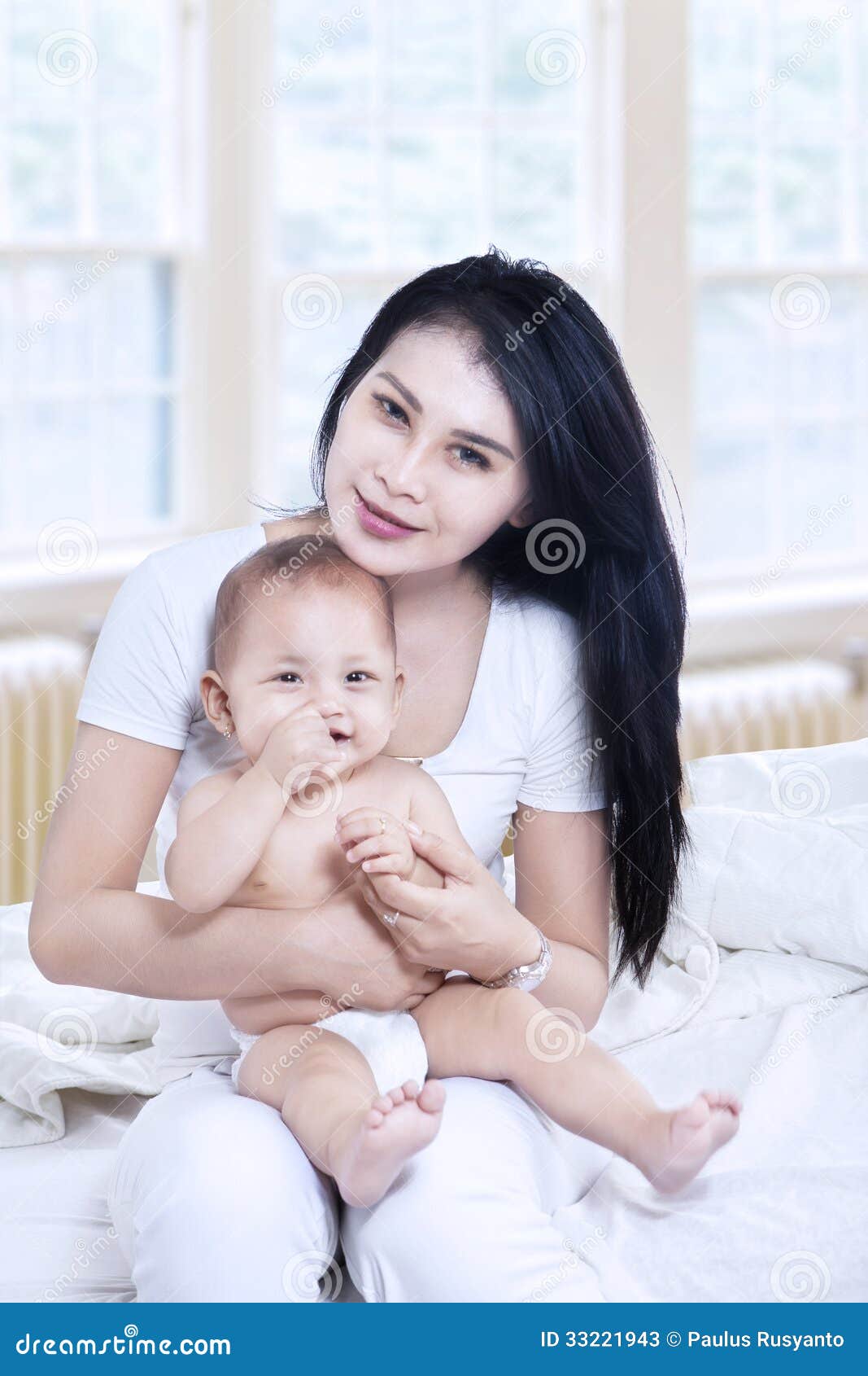 Asian Mother And Baby Sitting In Living Room Stock Image Image Of