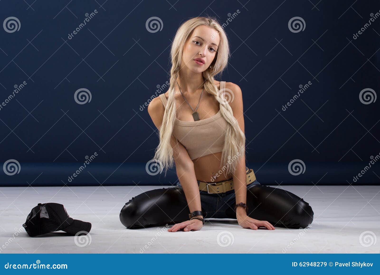 Attractive Blond Woman Sitting On Her Knees Stock Image Image Of