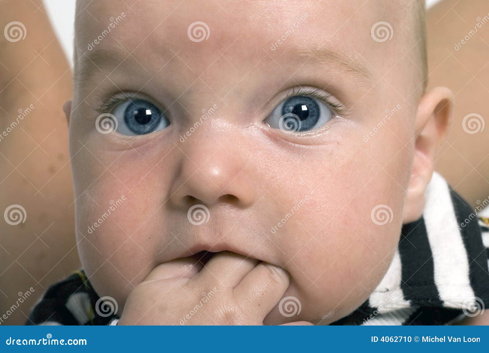 Baby Biting His Hand Stock Photo - Image: 4062710