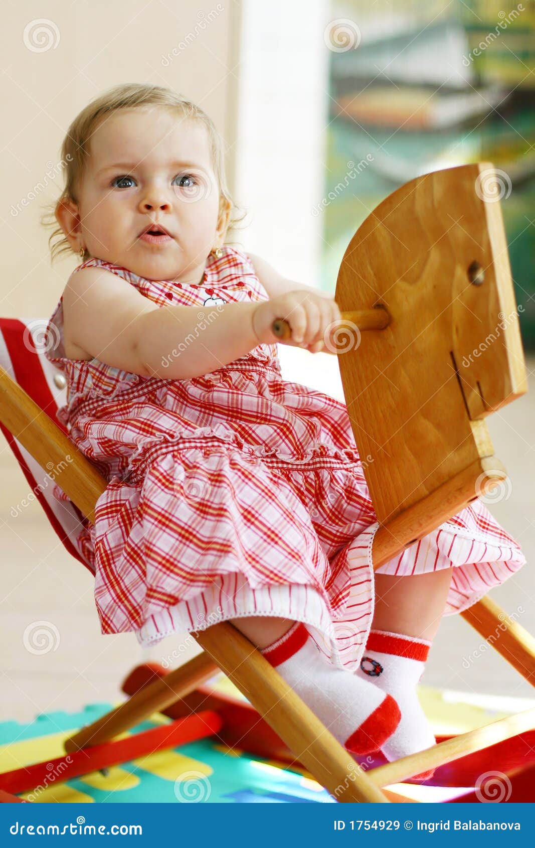 Baby On Rocking Horse Royalty Free Stock Images - Image: 1754929