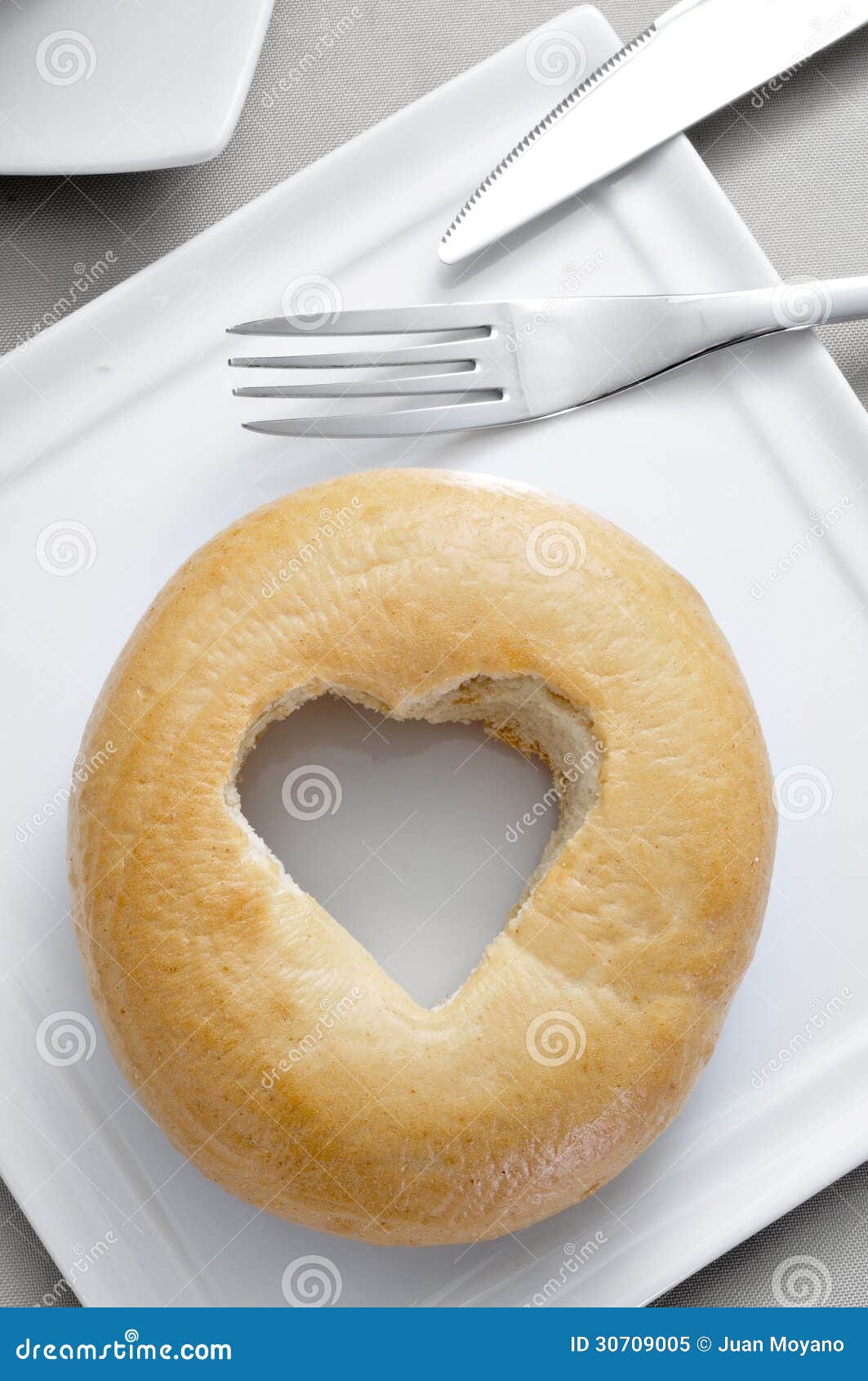 Bagel With A Heart-shaped Hole Royalty Free Stock Photo - Image: 30709005