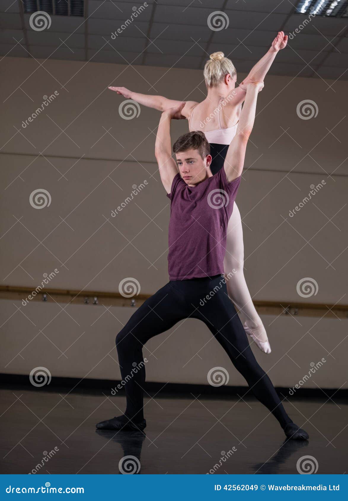 Ballet partners dancing gracefully together