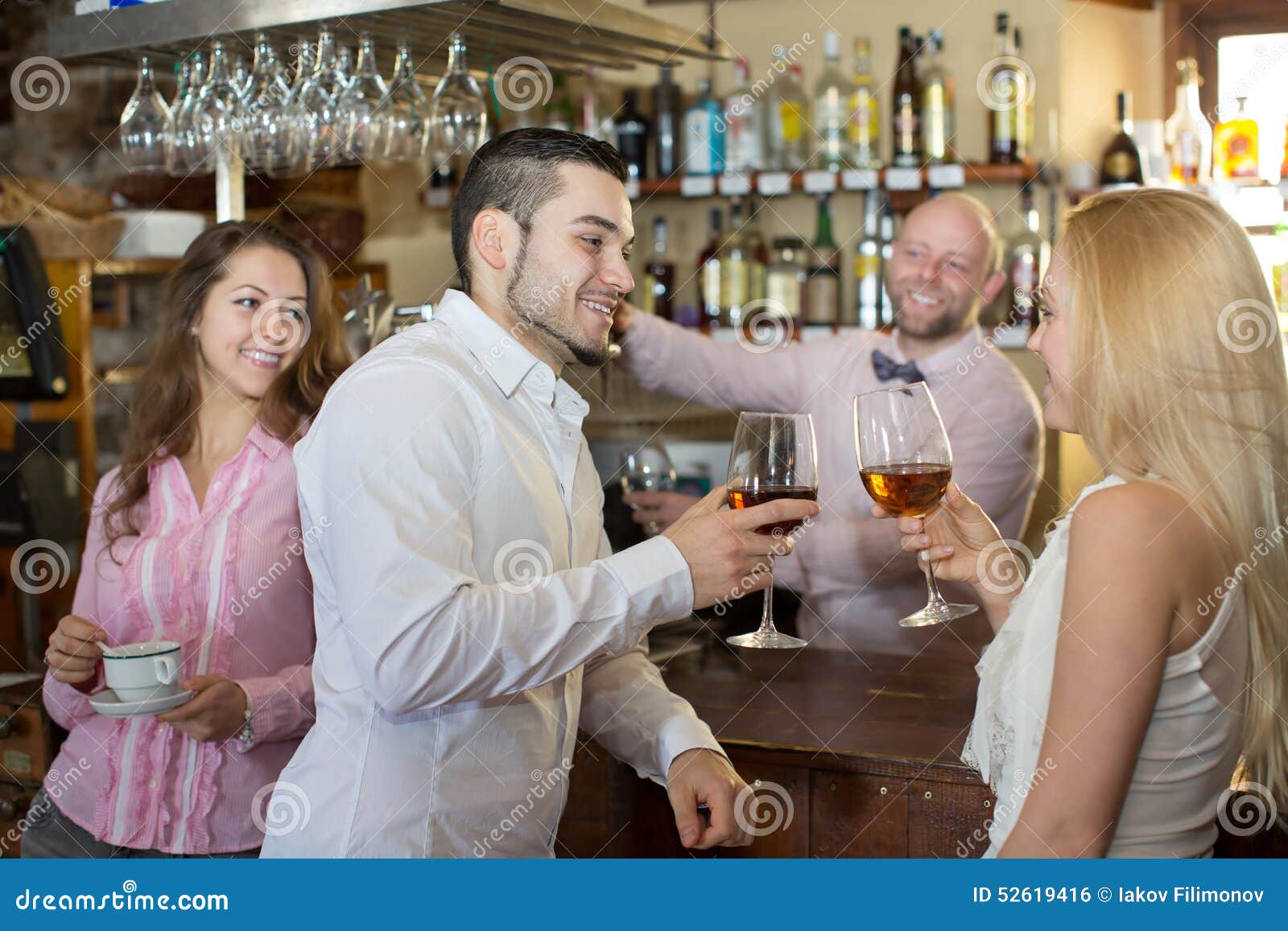 Bartender Entertaining Guests Stock Photo - Image: 52619416