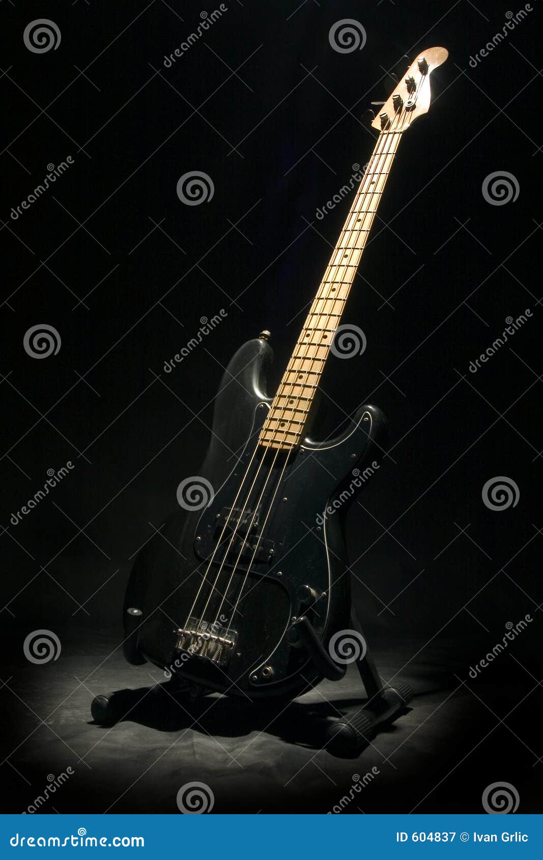 Bass guitar in dark