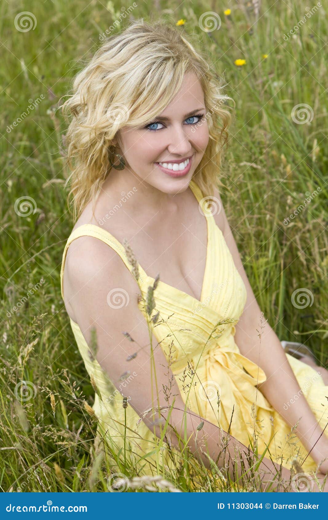 Beautiful Blond Woman Sitting In Tall Grass Stock Images Image 11303044