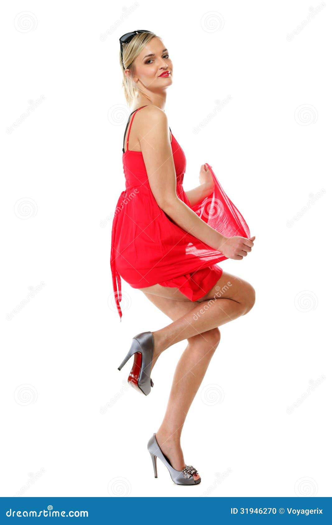 Full length beautiful blonde girl in red summer dress. Studio shot ... Full length beautiful blonde girl in red summer dress. Studio shot ...