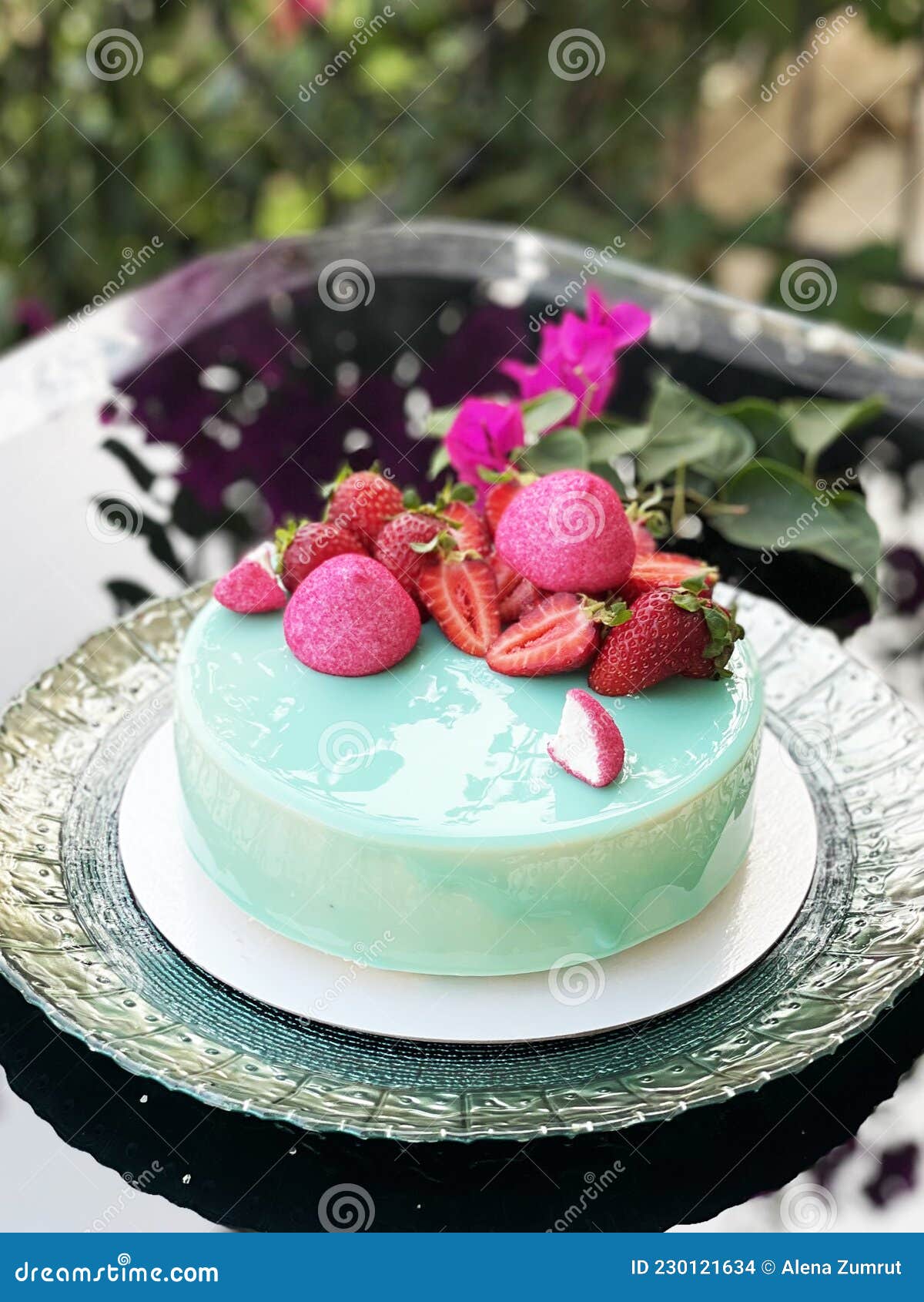 A Beautiful Delicious Mousse Cake On A Mirrored Table Juicy