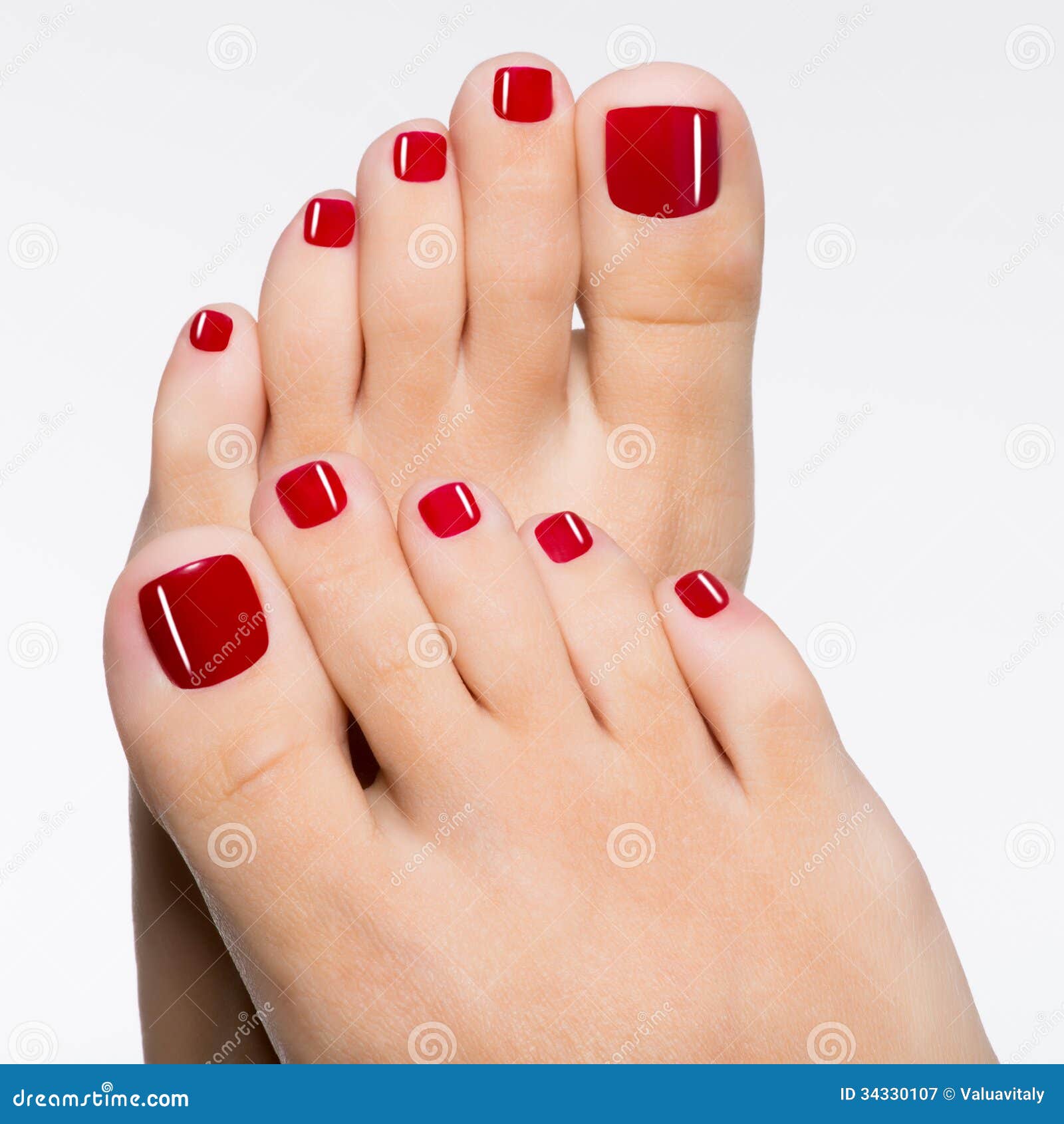 Beautiful Female Feet With Red Pedicure Royalty Free Stock Photography