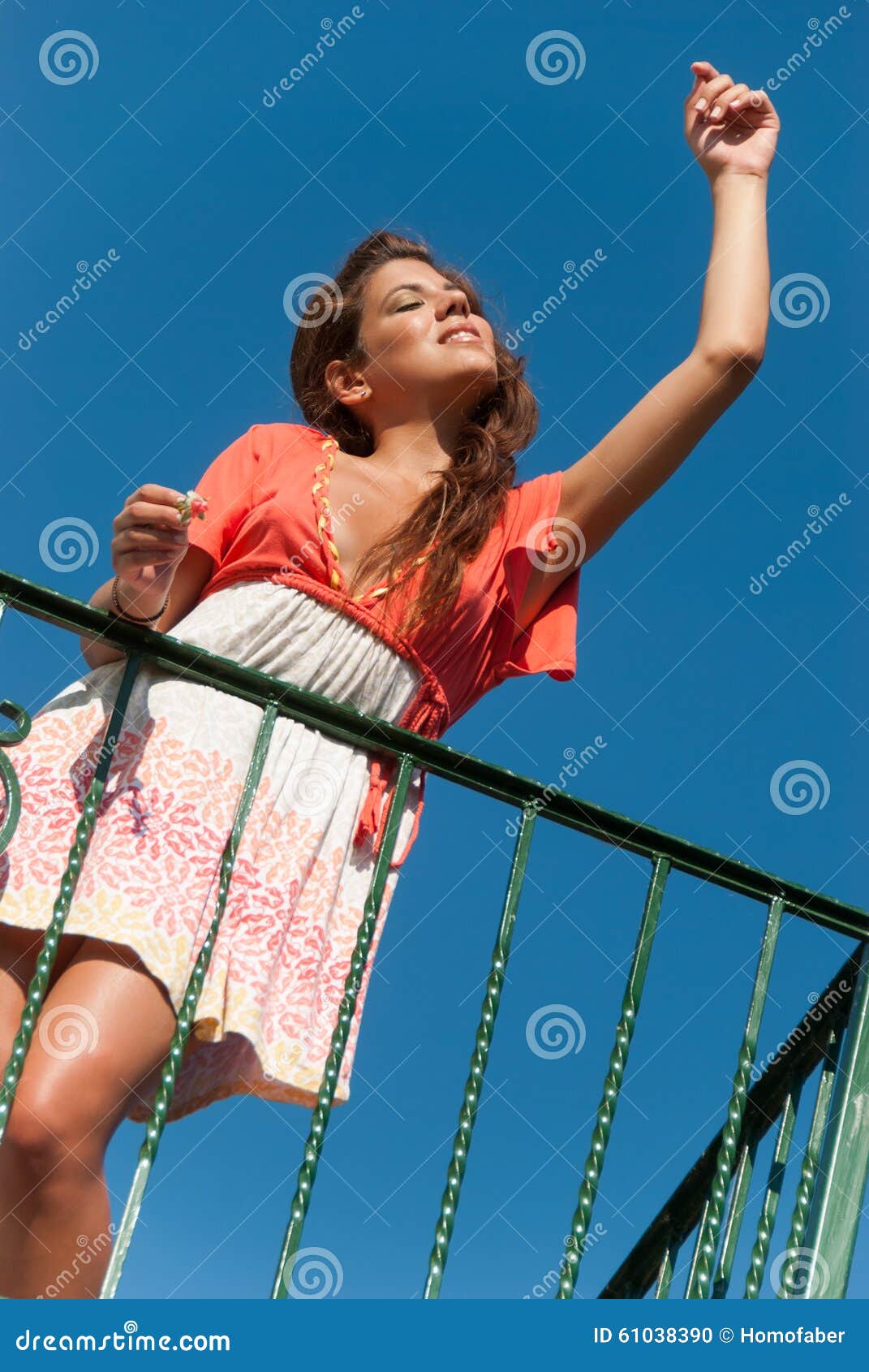 Beautiful Girl At Balcony With Fashion Dress And Hair