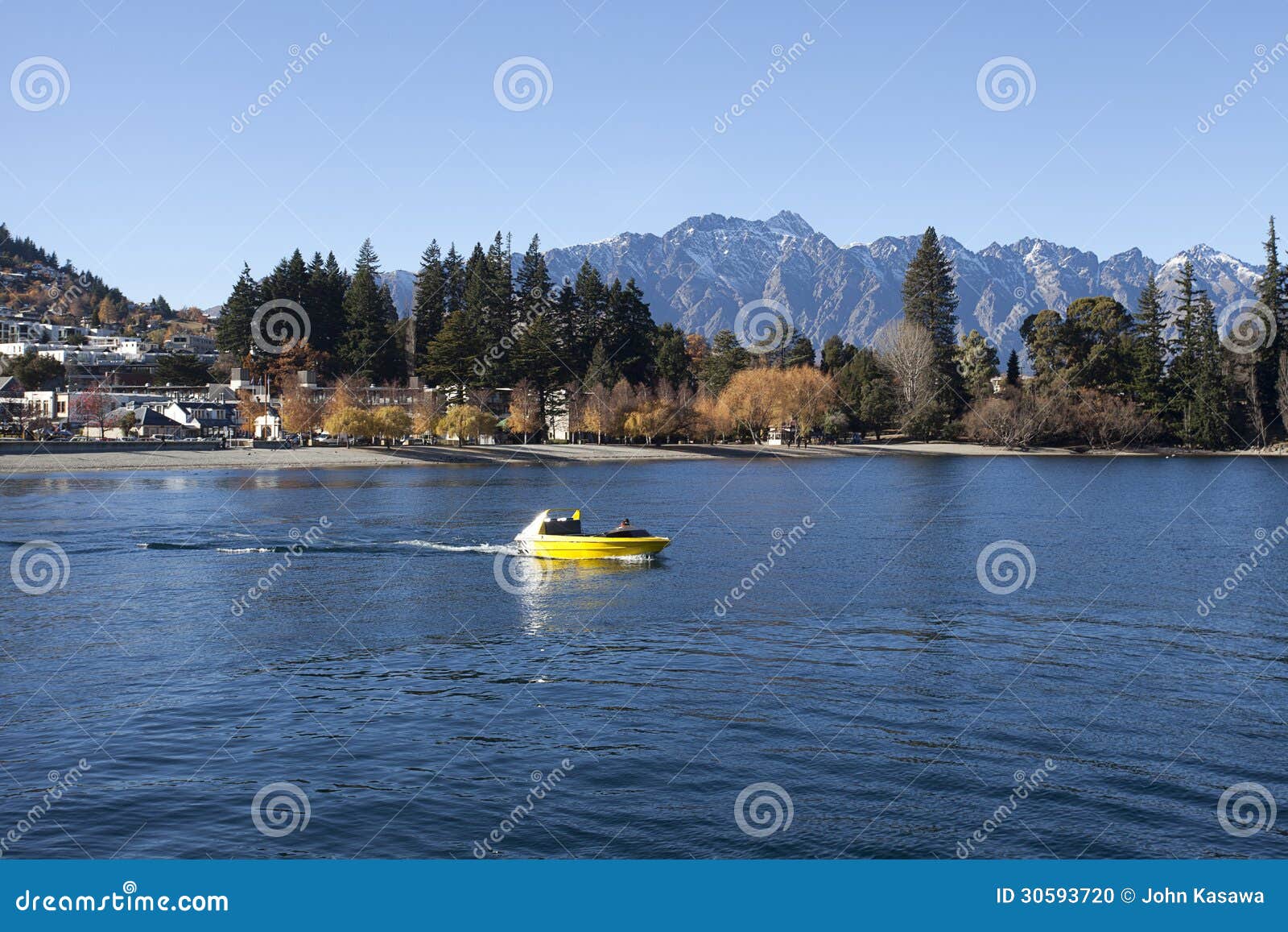 Speed boat and Beautiful Queenstown bay, New Zealand.