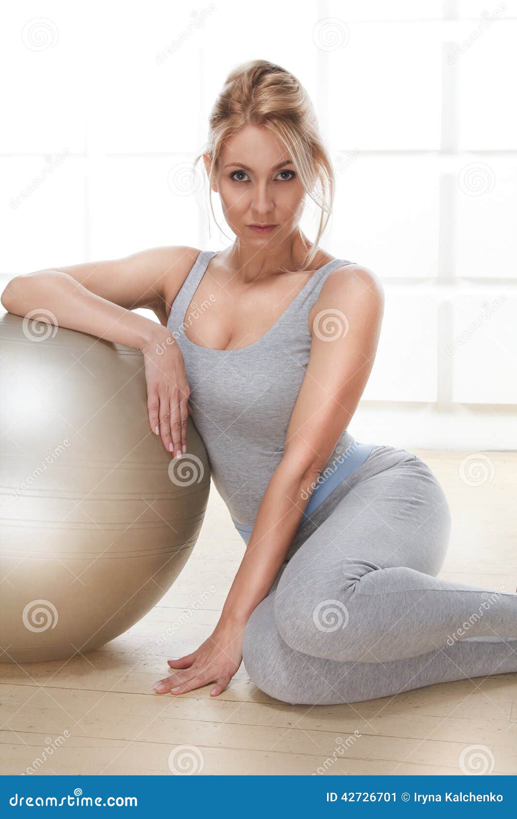 Beautiful Sexy Blonde Perfect Athletic Slim Figure Engaged In Yoga Exercise Or Fitness Lead A
