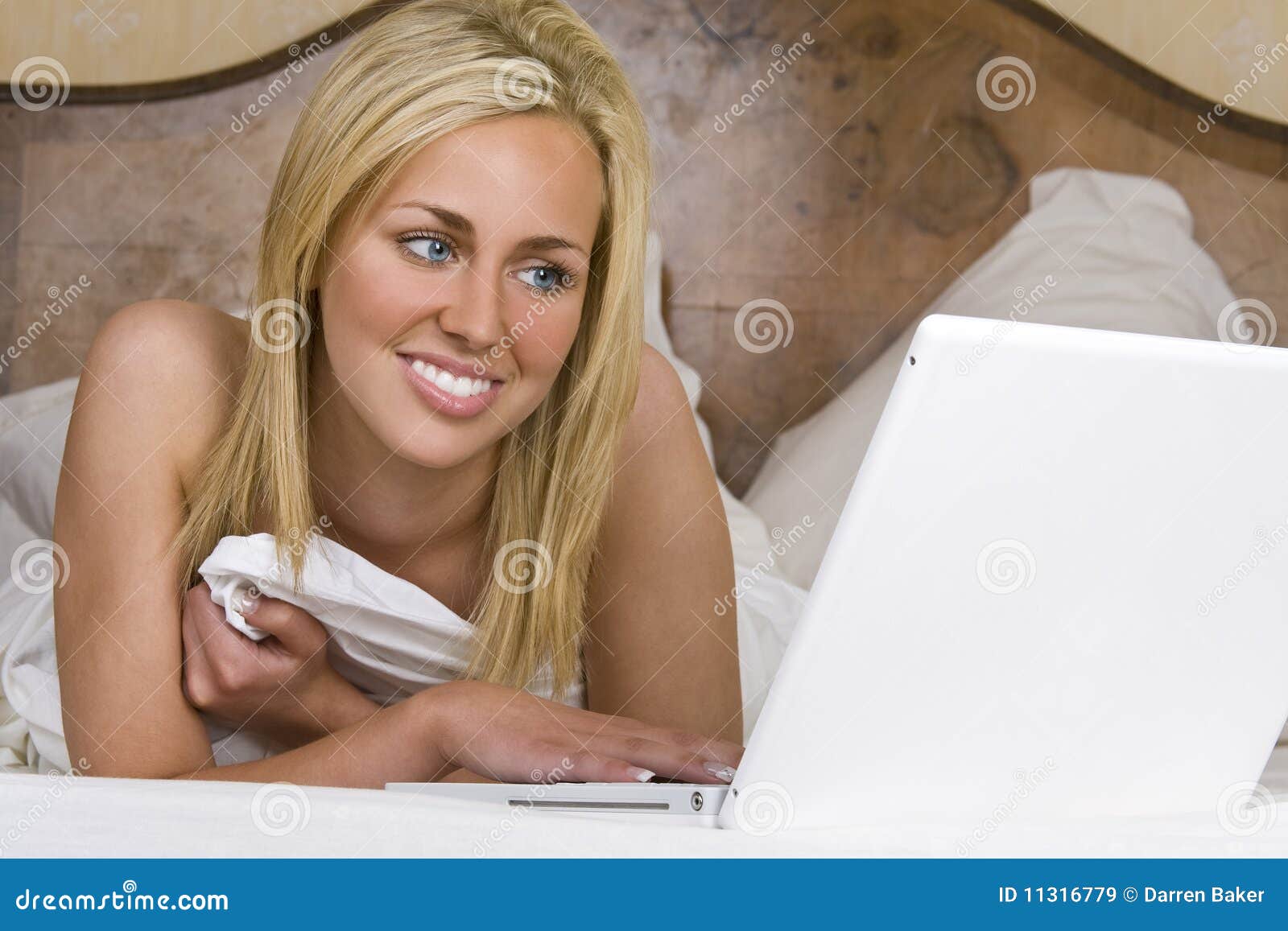 Beautiful Woman In Bed Using A Laptop Computer Royalty Free Stock Images Image 11316779