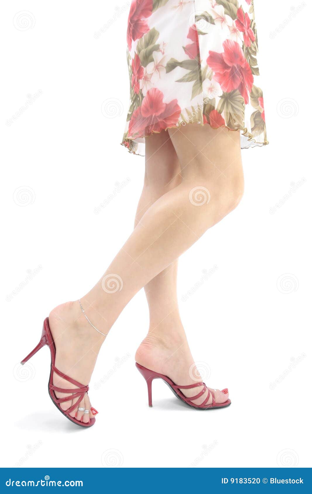 Beautiful Woman Legs And Feet Wearing Short Dress Stock