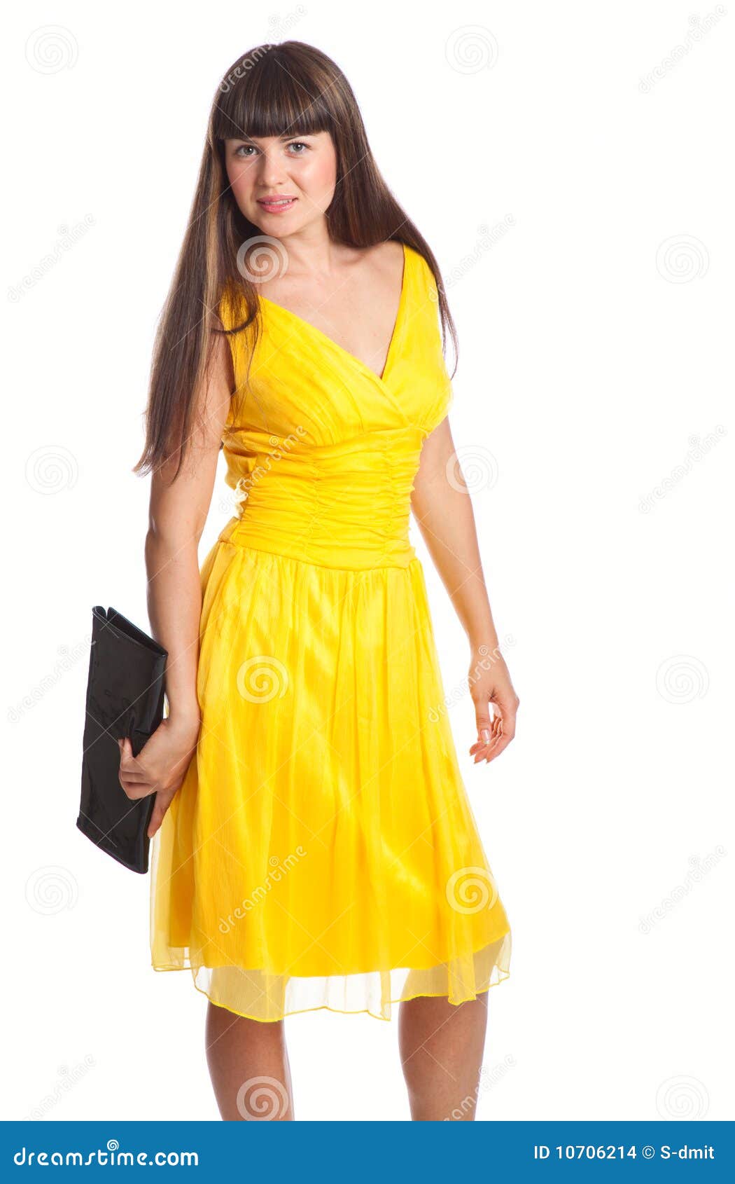 Beautiful woman in yellow dress with bags. Isolated on white ...