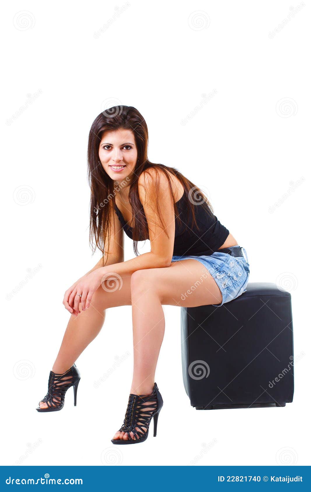 Beautiful Young Woman Sitting On Stool Stock Photo - Image: 22821740