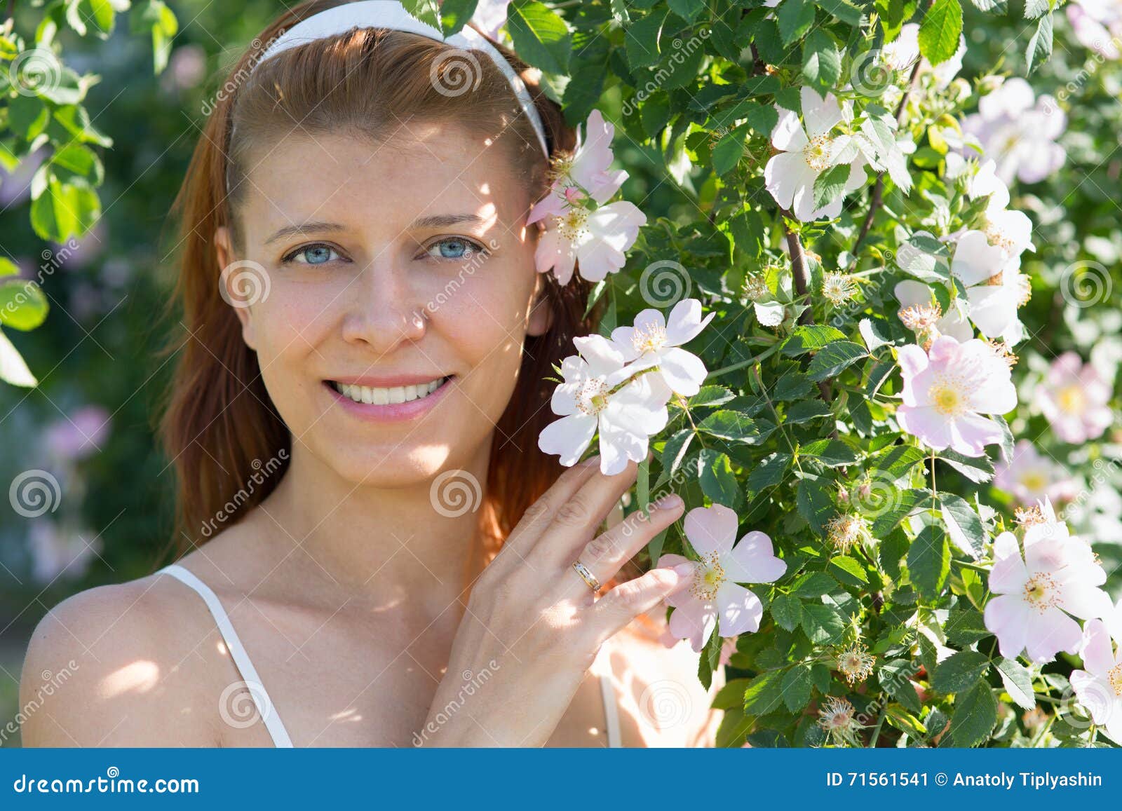 Beauty woman with flowers in garden - beauty-woman-flowers-garden-blossom-71561541