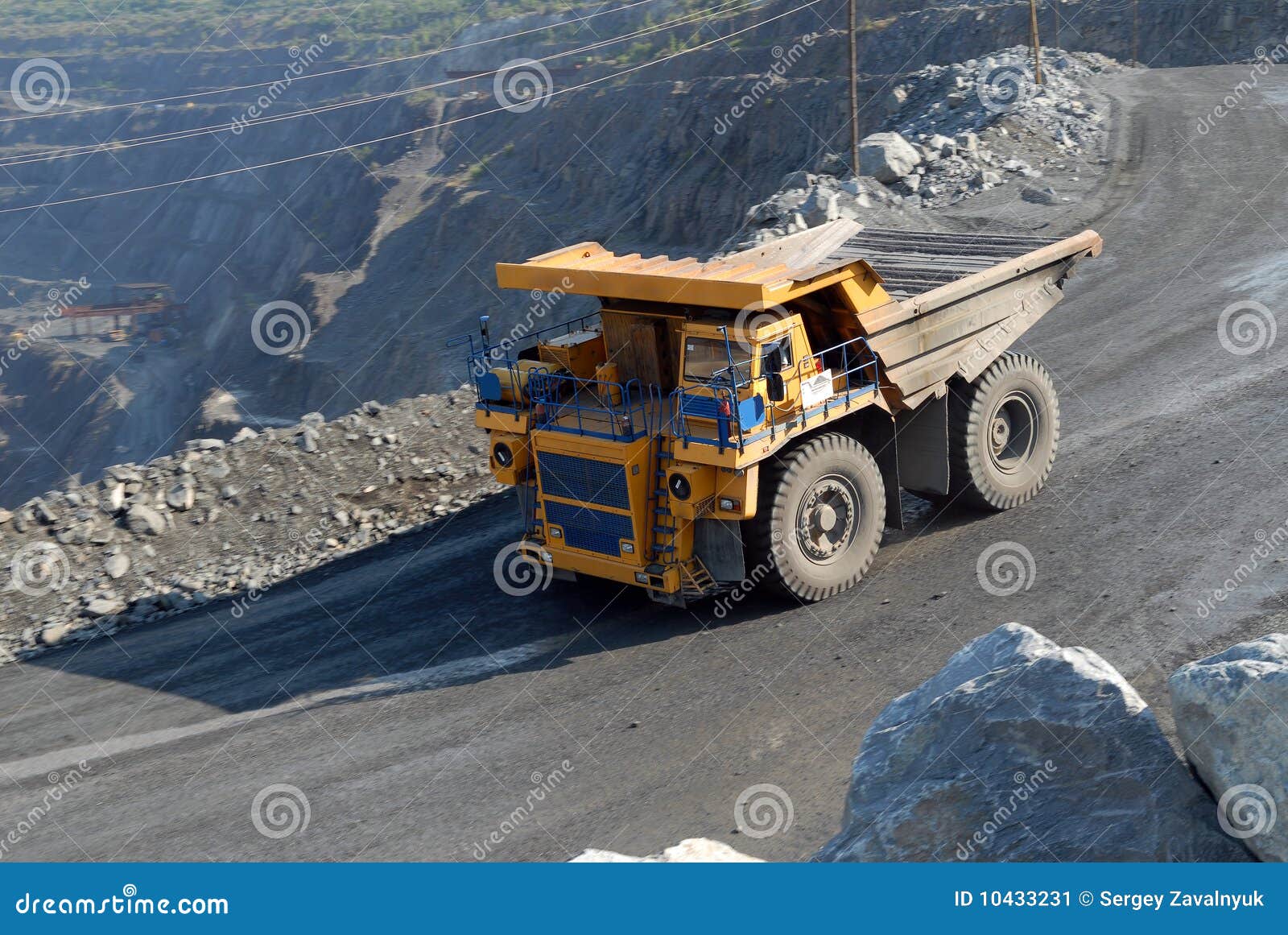 The big truck transport iron ore in career.