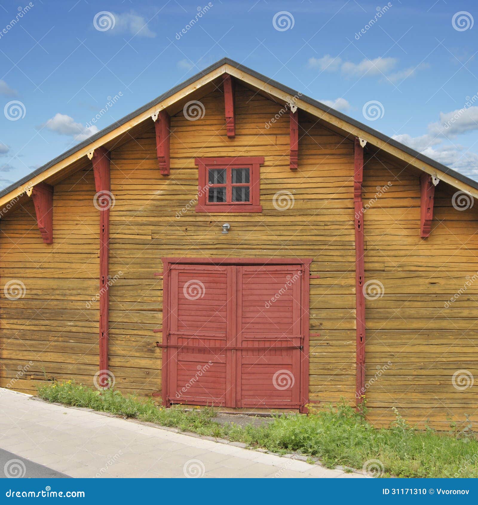 Ancient yellow wooden shed traditional for Western Finland.
