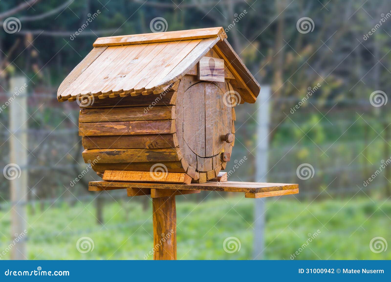 Birdhouse or homemade wooden mailbox with clipping path.