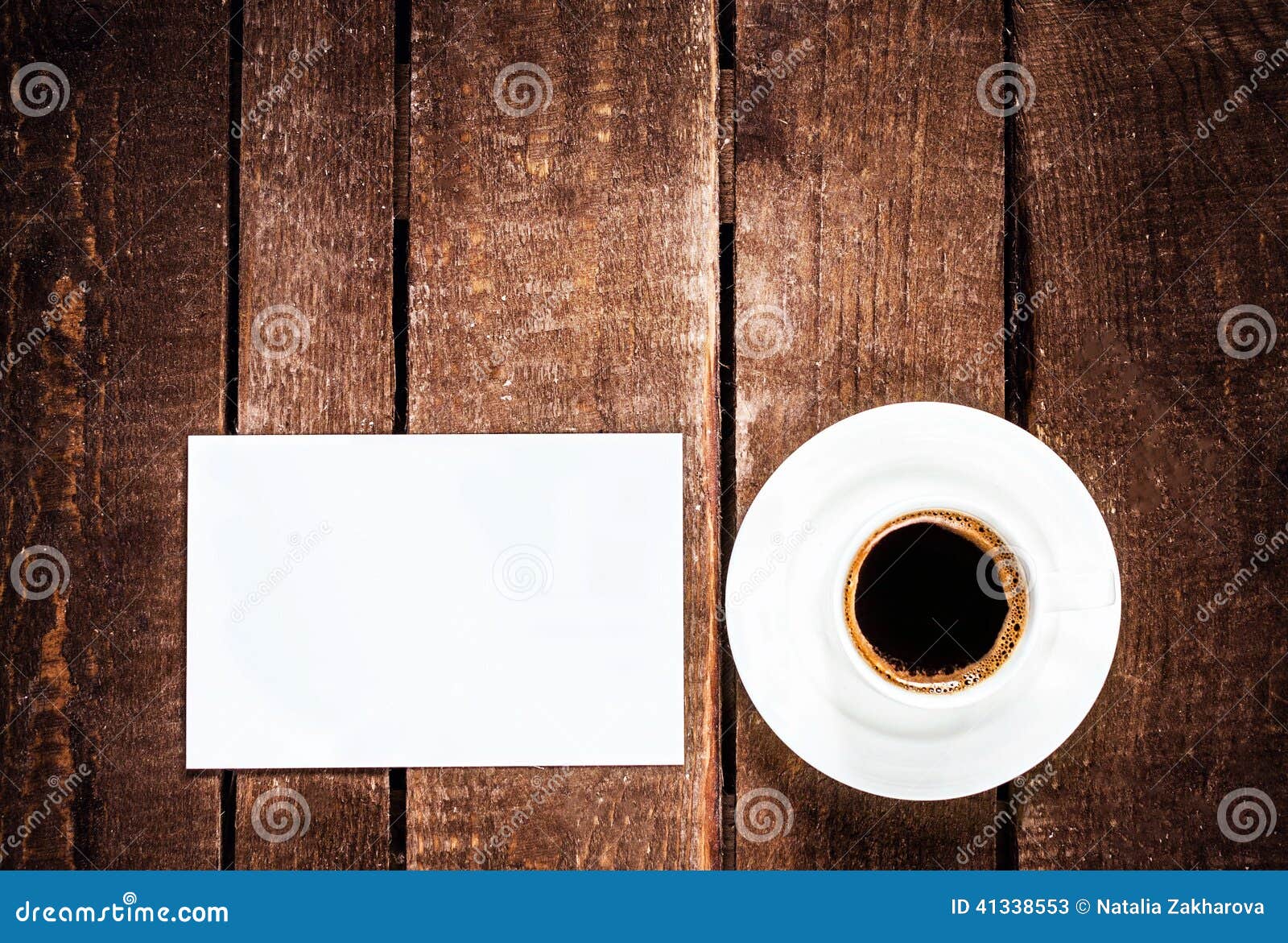  card on wooden table. White Card for text and Coffee, top view