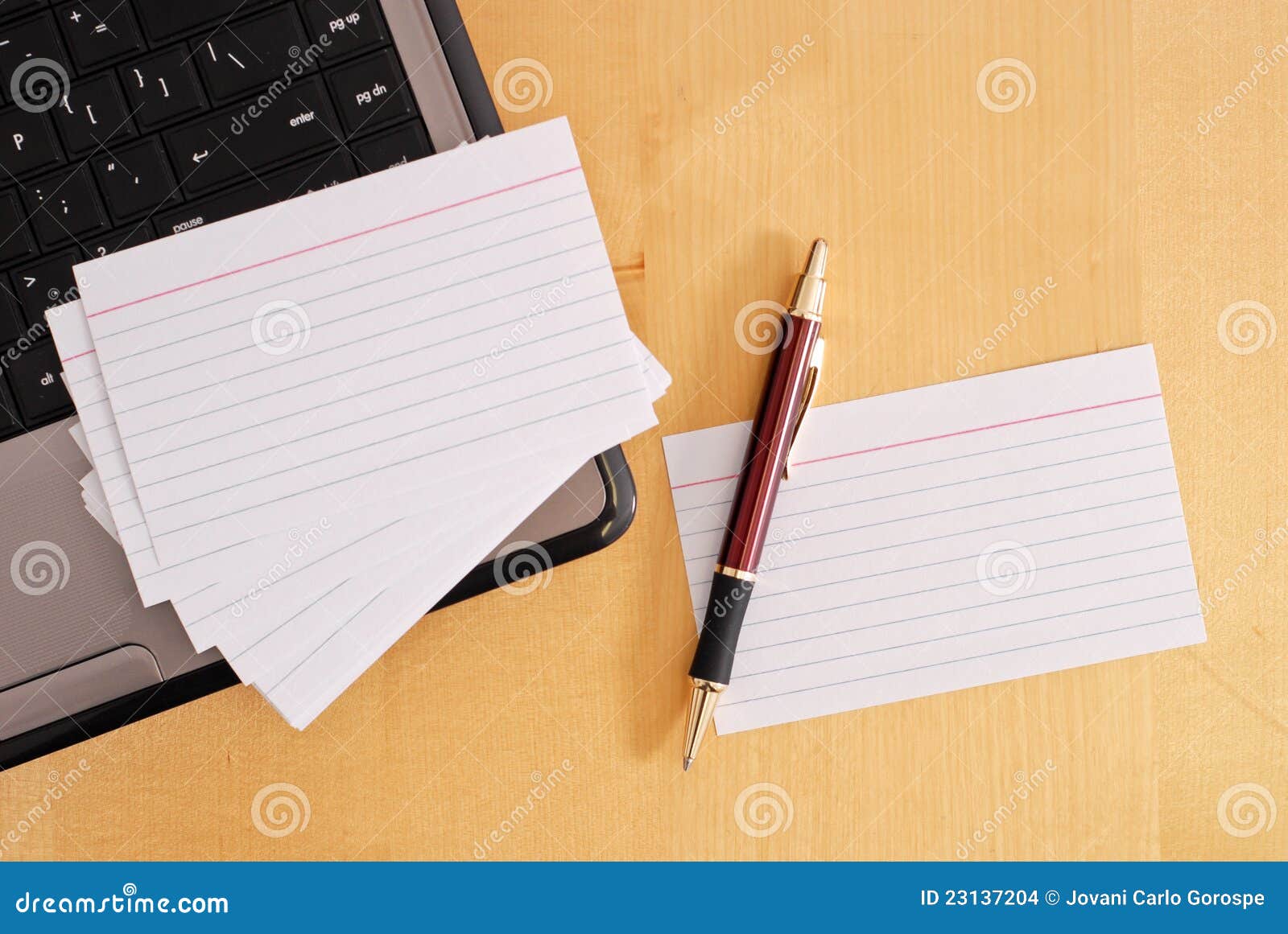 Blank Flash Cards with Pen and laptop.